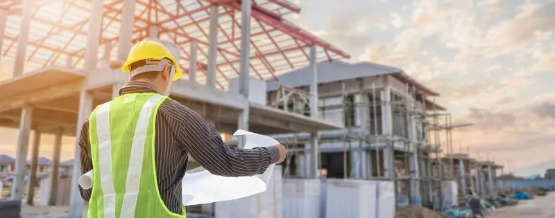 Site engineer checking work on a construction site